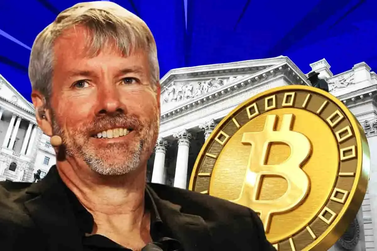 Michael Sayor with gold bitcoin at the background