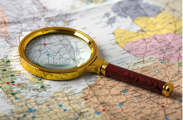 one cancels the other; Travel set with magnifying glass on map