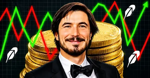 Robinhood CEO Vlad Tenev in front of stacked gold Bitcoin coins, with red and green market trend lines and upward-pointing arrows in the background.