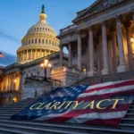 Senate Delays Clarity Act Vote Until After August Recess The U.S. Capitol building at dusk with a large American flag banner reading “CLARITY ACT” displayed across the steps.