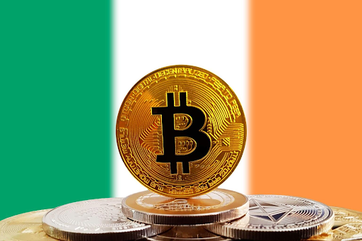 Bitcoin coin displayed above a stack of cryptocurrency coins against the Ireland flag.