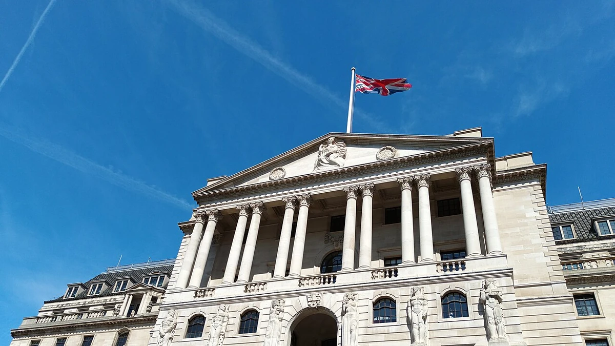 Bank of England building in London with the Union Jack flying above its classical facade.
