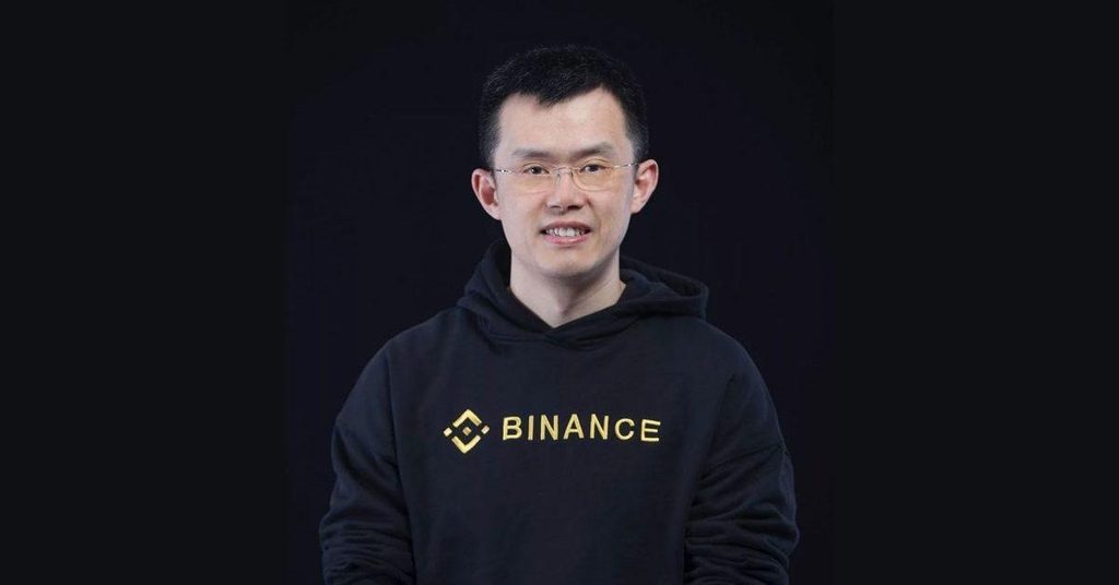 Image of Changpeng “CZ” Zhao wearing a black hoodie with Binance label