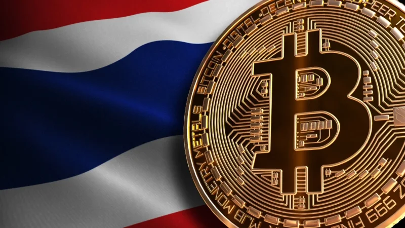 Bitcoin coin displayed against the national flag of Thailand, representing cryptocurrency and Bitcoin activity in Thailand.